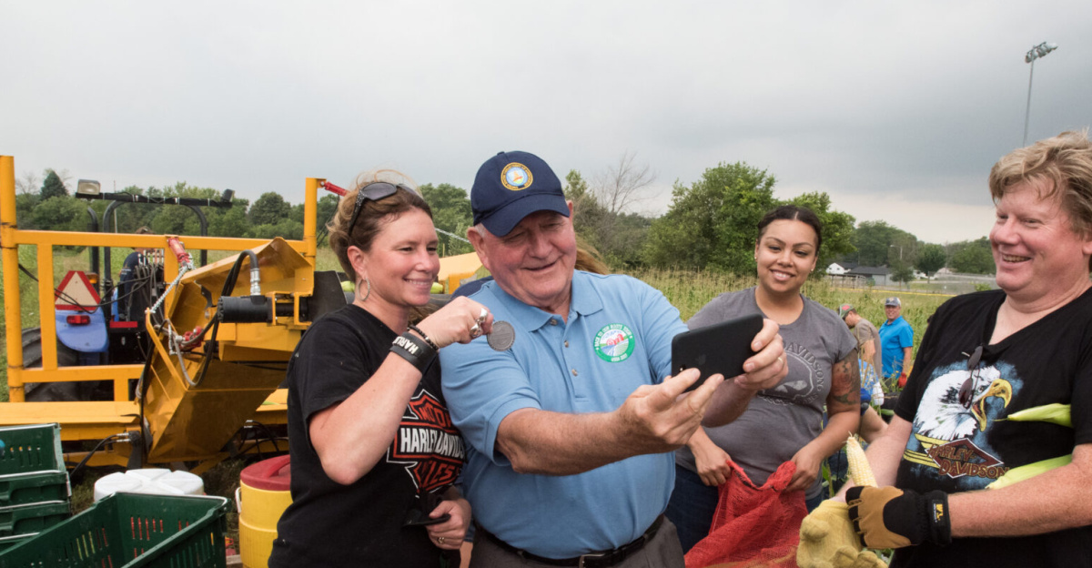 <p>U.S. Secretary of Agriculture Sonny Perdue tours the Hunger Task Force Farm vegetable farm, which administers USDA commodity programs and services area food pantries and food banks in and around Franklin, WI, on Aug. 3, 2017.
</p>
According to the Hunger Task Force Farm, the Farm grows fresh fruits and vegetables for the express purpose of feeding the hungry, creating a reliable source of healthy food for our network. Every pound of produce is delivered free of charge. All the Wisconsin staples are grown, including corn, peppers, green beans, asparagus, apples, pears and cantaloupe—over 30 varieties of fruits and vegetables in all. The Farm produces more than 750,000 pounds of fresh fruits and vegetables every year. All delivered free to the hungry in Milwaukee. Secretary Perdue begins a five-state RV tour today. This “Back to Our Roots” Tour, will gather input on the 2018 Farm Bill and increasing rural prosperity, at the Wisconsin State Fair Park, in West Allis, near Milwaukee, MN, on Aug. 3, 2017. Along the way, Perdue will meet with farmers, ranchers, foresters, producers, students, governors, Members of Congress, U.S. Department of Agriculture (USDA) employees, and other stakeholders.  This is the first of two RV tours the secretary will undertake this summer. “The ‘Back to our Roots’ Farm Bill and rural prosperity RV listening tour will allow us to hear directly from people in agriculture across the country, as well as our consumers – they are the ones on the front lines of American agriculture and they know best what the current issues are,” Perdue said.  “USDA will be intimately involved as Congress deliberates and formulates the 2018 Farm Bill.  We are committed to making the resources and the research available so that Congress can make good facts-based, data-driven decisions.  It’s important to look at past practices to see what has worked and what has not worked, so that we create a farm bill for the future that will be embraced by American agriculture in 2018.”  This first RV Tour will feature stops in five states: Wisconsin, Minnesota, Iowa, Illinois, and Indiana.  For social media purposes, Secretary Perdue’s Twitter account (@SecretarySonny) will be using the hashtag #BackToOurRoots. USDA Photo by Lance Cheung.