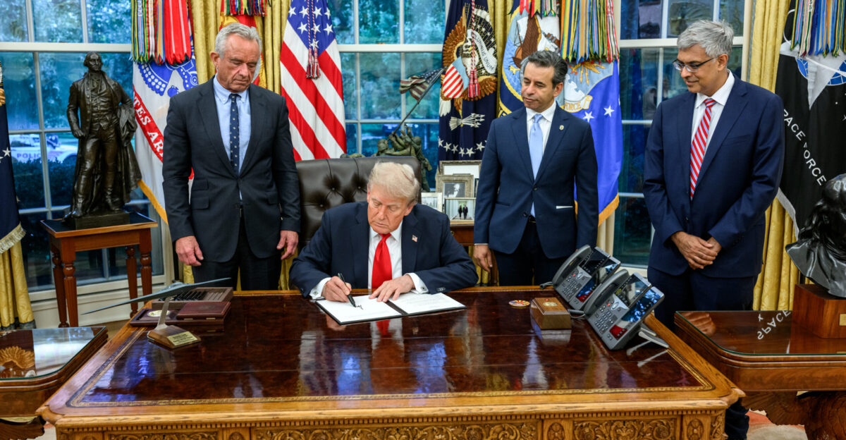 President Donald Trump signs an Executive Order alongside HHS Secretary Robert F Kennedy Jr Tuesday September 9 2025 in the Oval Office Official White House Photo by Daniel Torok