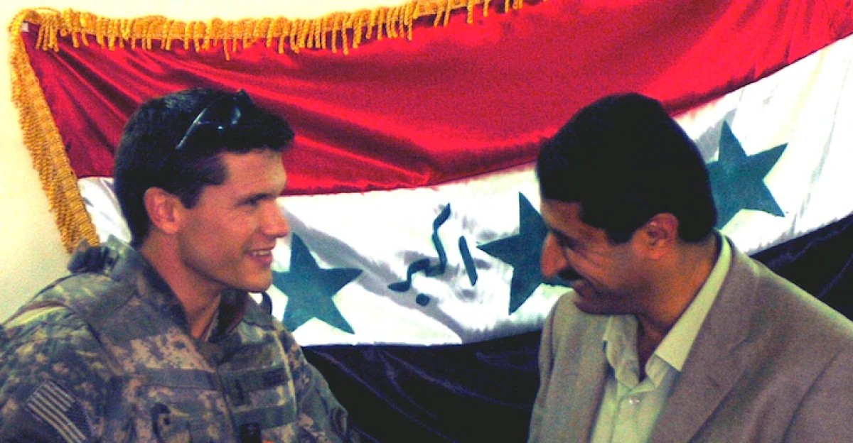 Pete Hegseth meeting with the mayor of Samarra, Iraq, Manmood Kalaf Ahmed, in 2005. Hegseth was attached to an active-duty unit operating in the city of Samarra and was recognized for work as a platoon leader and a civil affairs officer.