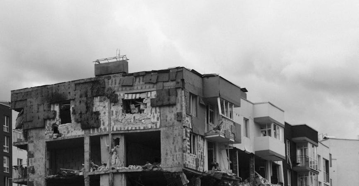 A devastated apartment building in Bucha Ukraine showing the effects of war