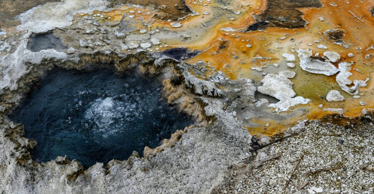 Colorful geothermal hot spring with vibrant mineral deposits in Yellowstone National Park