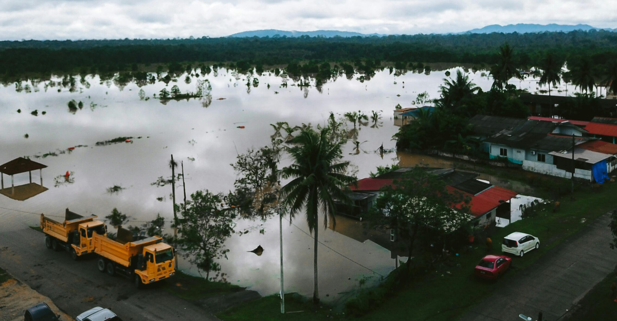 Aerial view of a flooding landscape in Kijal, Terengganu, Malaysia, illustrating the impact of natural disasters.
