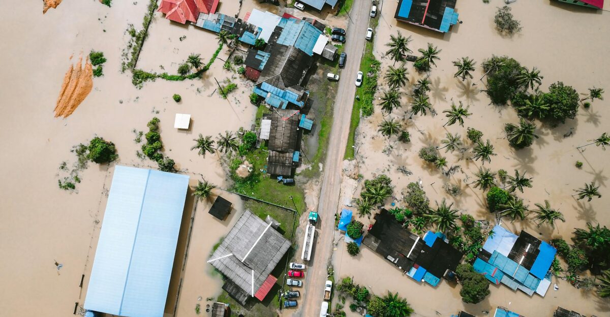 Drone view of a residential area in Kijal Malaysia showing extensive flooding and submerged buildings