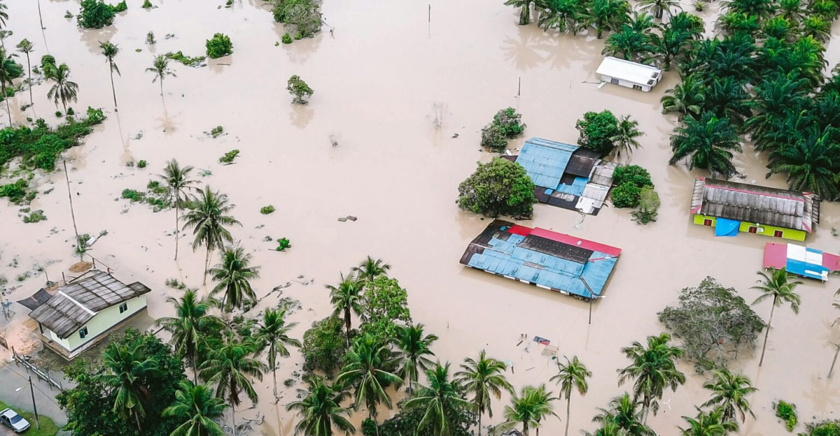 Drone shot capturing extensive flooding in Kijal, Malaysia village.