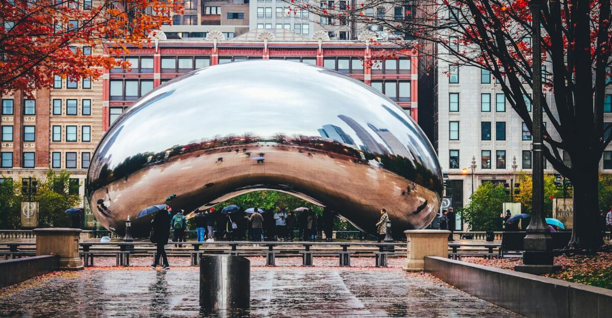 The iconic Cloud Gate sculpture also known as The Bean on a rainy day in Millennium Park Chicago