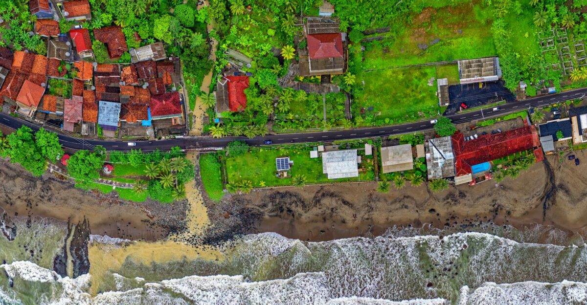 Vibrant aerial view of Cisolok West Java showcasing coastline and colorful houses
