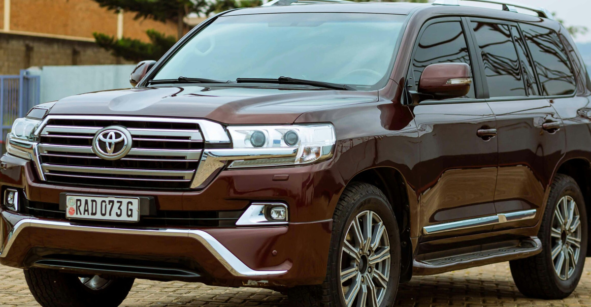 Elegant Toyota Land Cruiser parked on a cobblestone driveway during the day.