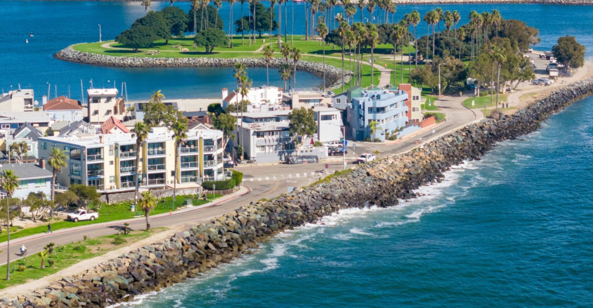 Stunning drone shot of San Diego's coastline, showcasing urban cityscape and ocean views.