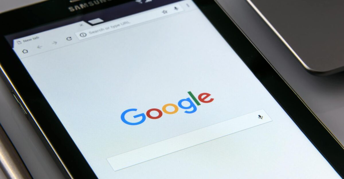 Close-up of a tablet displaying Google s search screen emphasizing technology and internet browsing