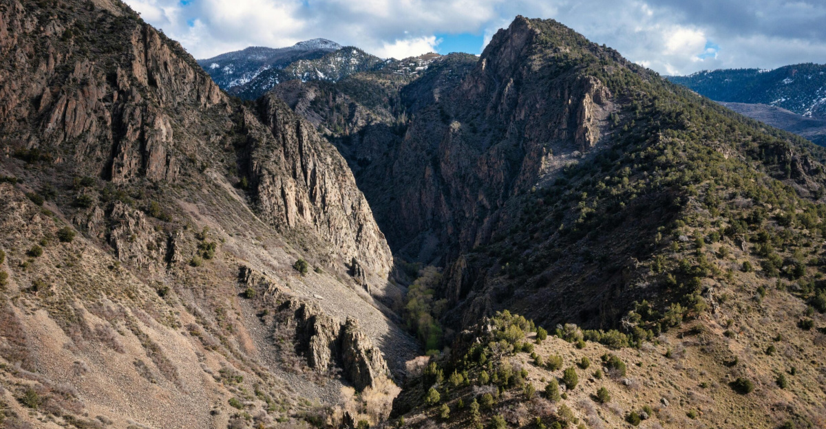 Breathtaking aerial view of Monroe, Utah's stunning canyons and mountainous landscape.