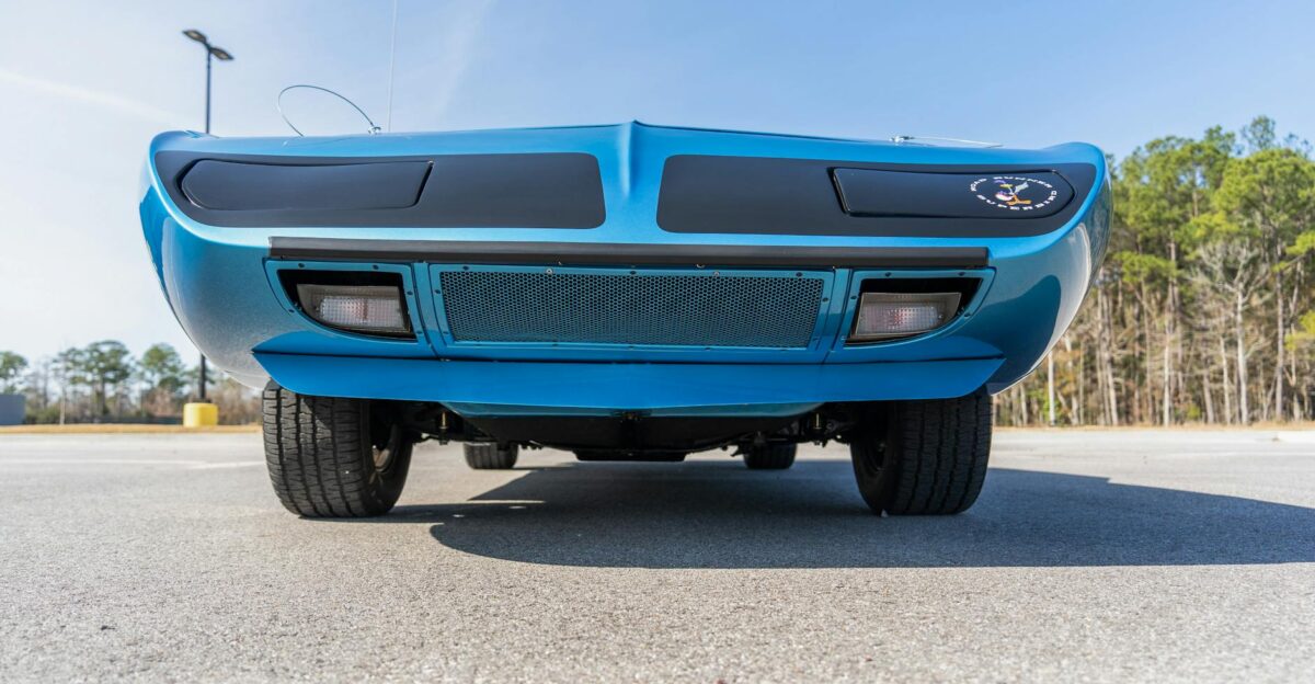 Iconic Plymouth Superbird car s front view captured outdoors in Madisonville Louisiana