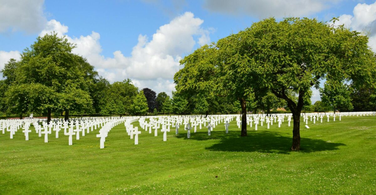 Serene view of white crosses at Normandy American Cemetery Montjoie-Saint-Martin France