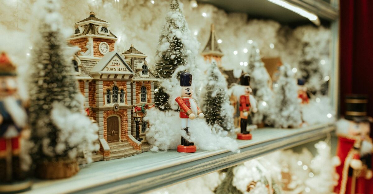 Charming Christmas village display with nutcrackers and snowy trees Perfect holiday decor inspiration