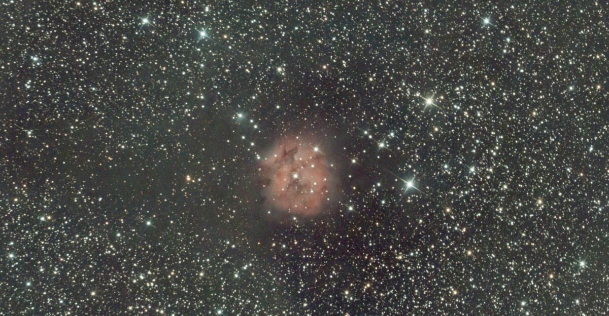 A breathtaking view of the Rosette Nebula surrounded by countless stars in the night sky
