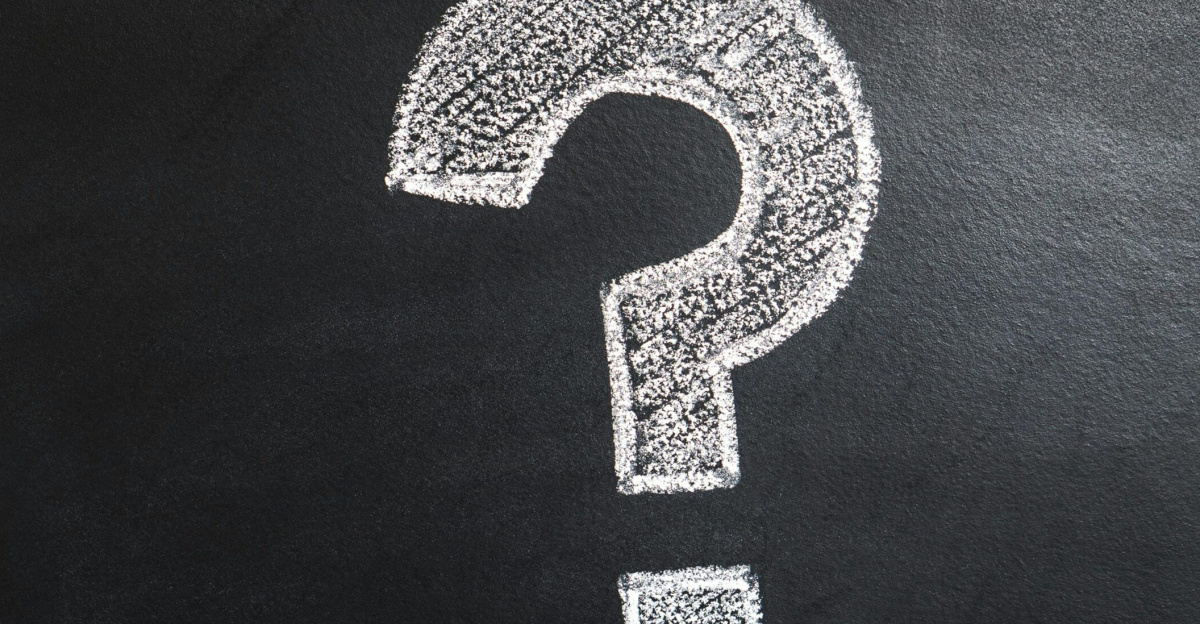 A conceptual image featuring a question mark drawn on a chalkboard, ideal for problem-solving contexts.