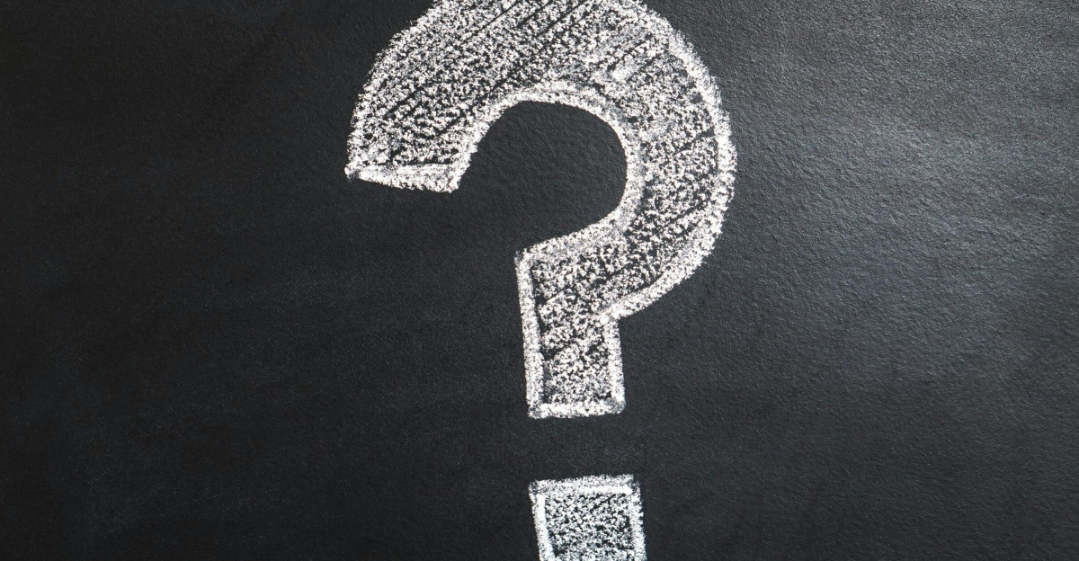 A conceptual image featuring a question mark drawn on a chalkboard, ideal for problem-solving contexts.