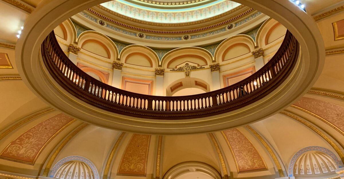 Intricate design of a dome ceiling inside Sacramento s Capitol Building showcasing classic architectural elements