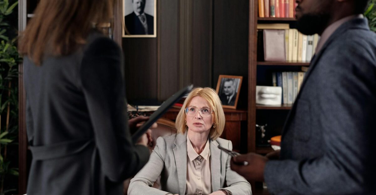 Diverse team discussing strategies in a professional office setting