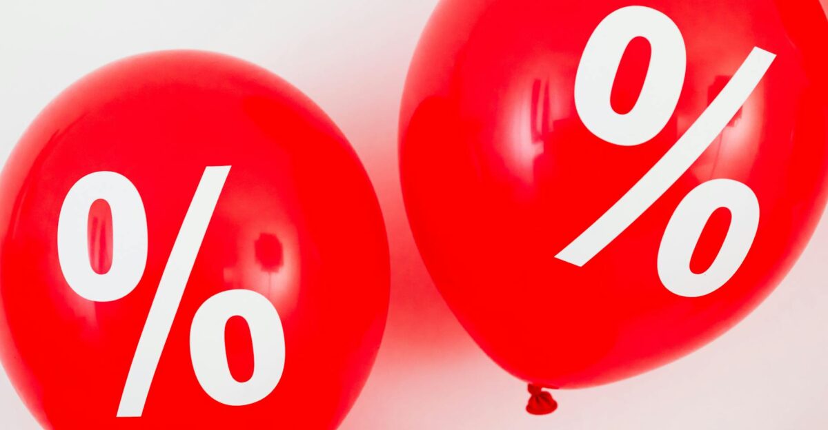 Red balloons featuring percentage symbols ideal for sales and promotions