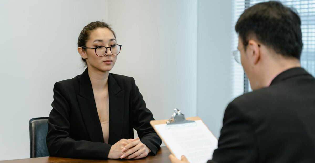Business interview scene with professionals in office setting