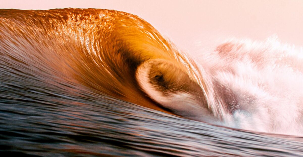 Vibrant golden ocean wave captured at sunset in Miyazaki Japan showcasing natural beauty