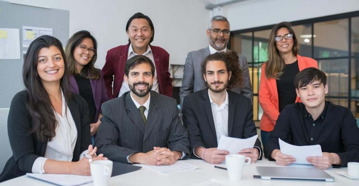A multicultural business team collaborating in a modern office meeting room