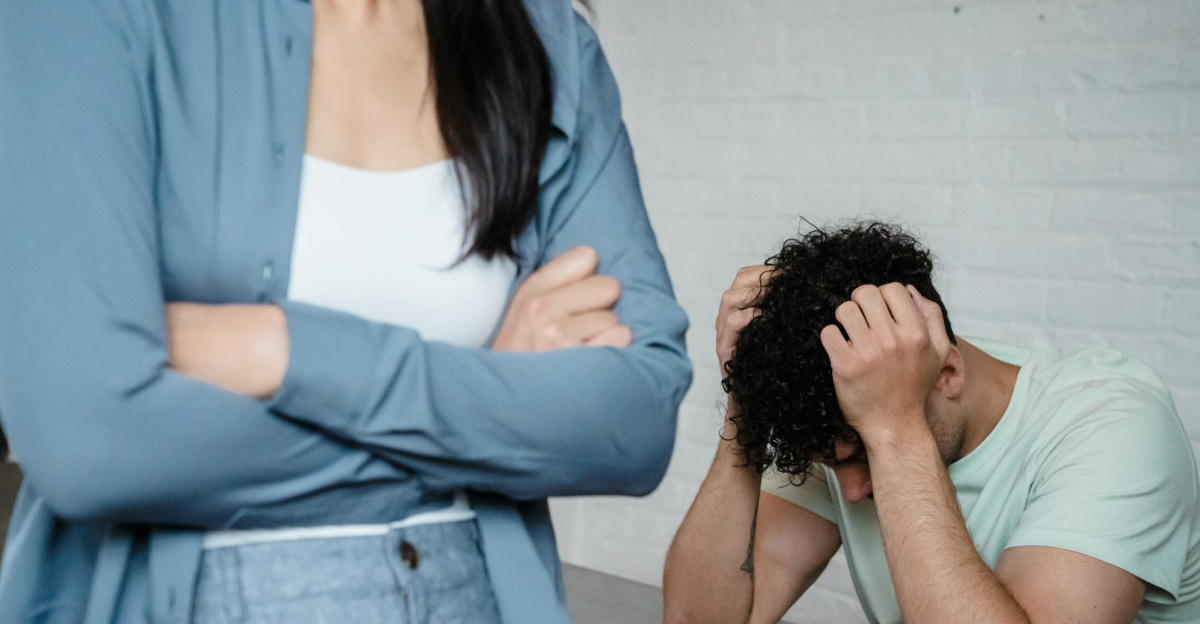 A couple experiencing relationship stress and conflict in an indoor setting, illustrating discord and tension.