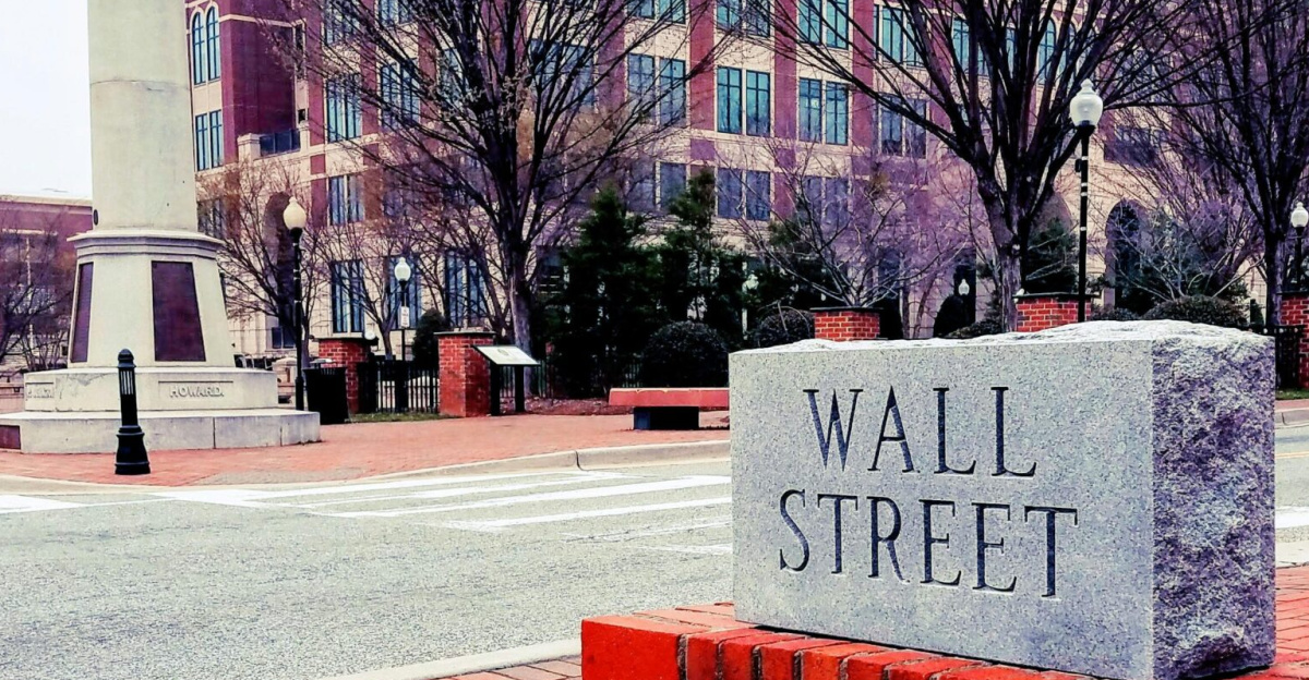 Brick sculpture of Wall Street in Spartanburg's historic area shows red bricks and iconic statue.