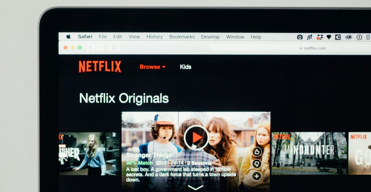 person using silver and black laptop computer