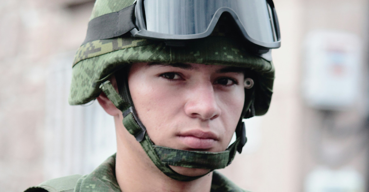 man with battle helmet and goggle