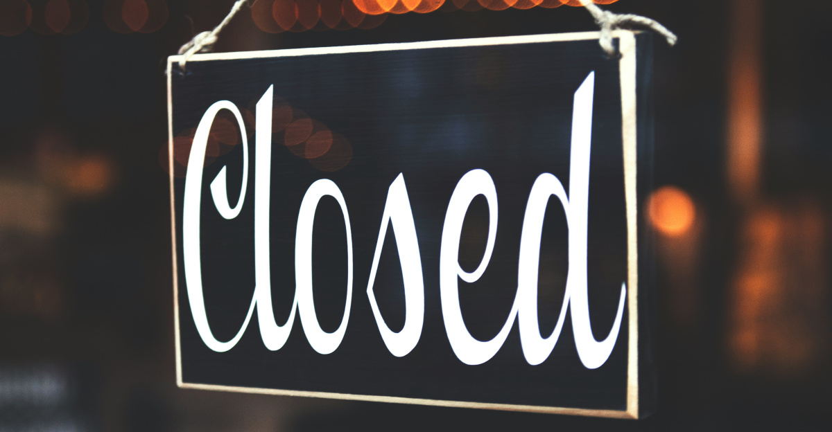 bokeh photography of closed signage