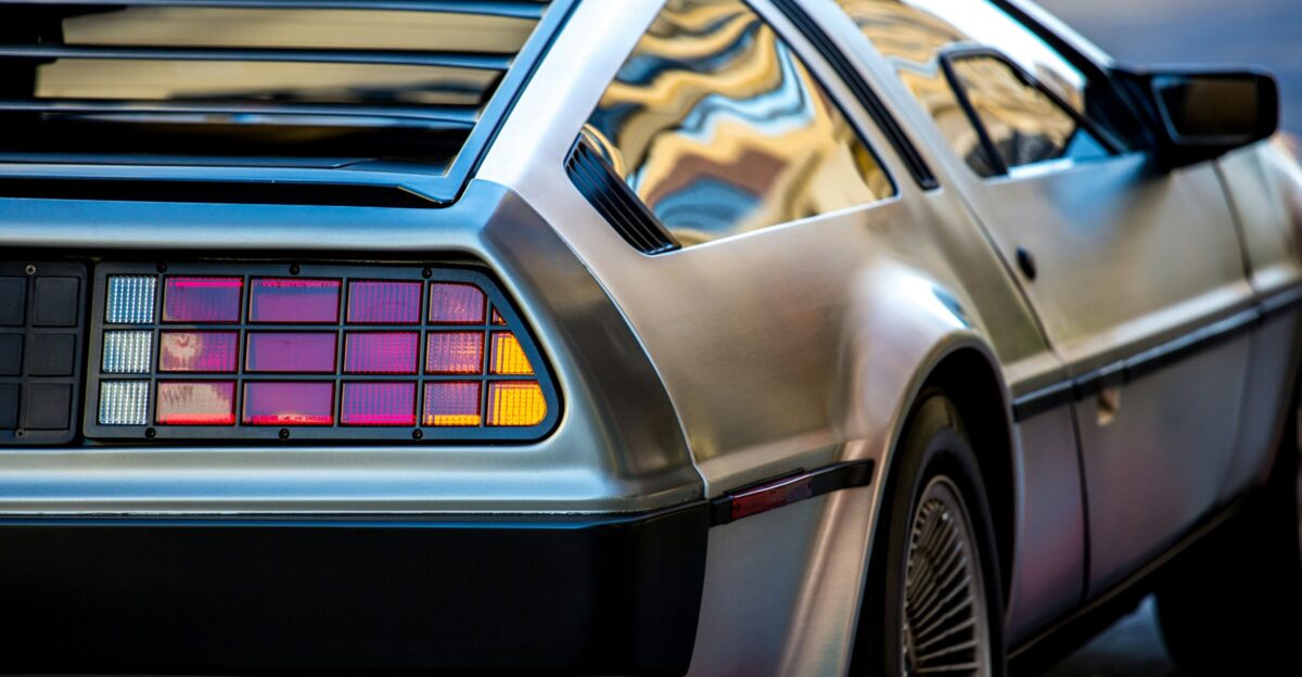 gray coupe on road in focus photography