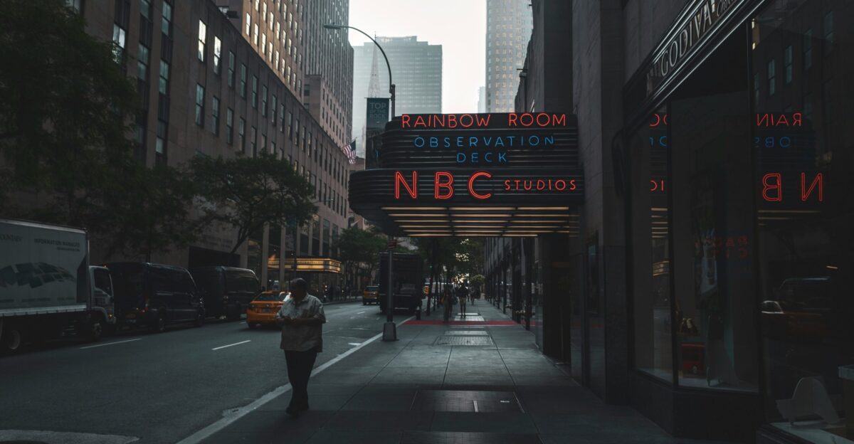 person walking on sidewalk