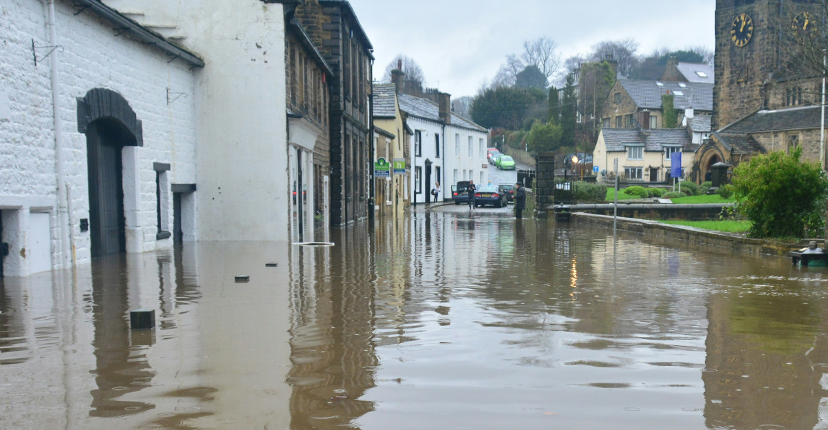 flooded town under blue sky and white clouds