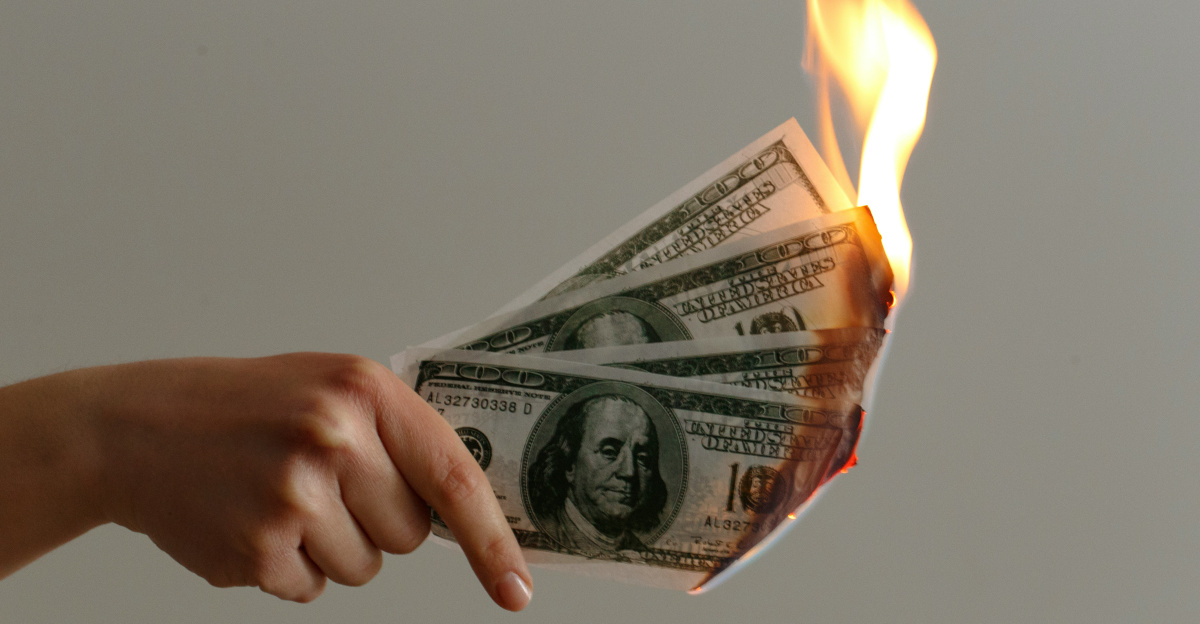 burned 100 US dollar banknotes