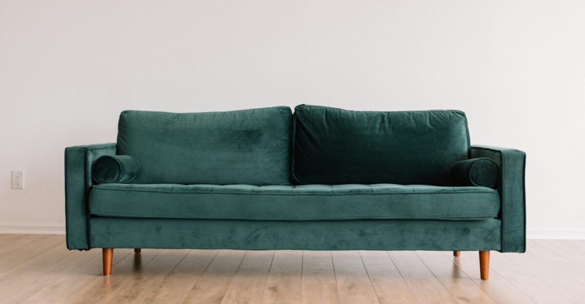 green fabric sofa