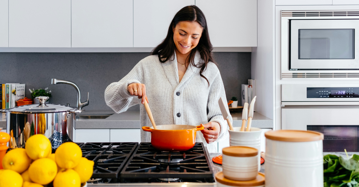 woman cooking inside kitchen room