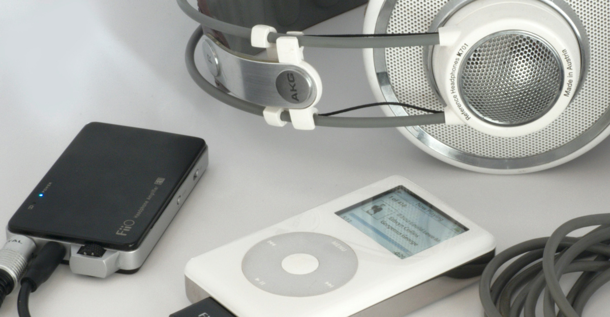 white and silver headphones