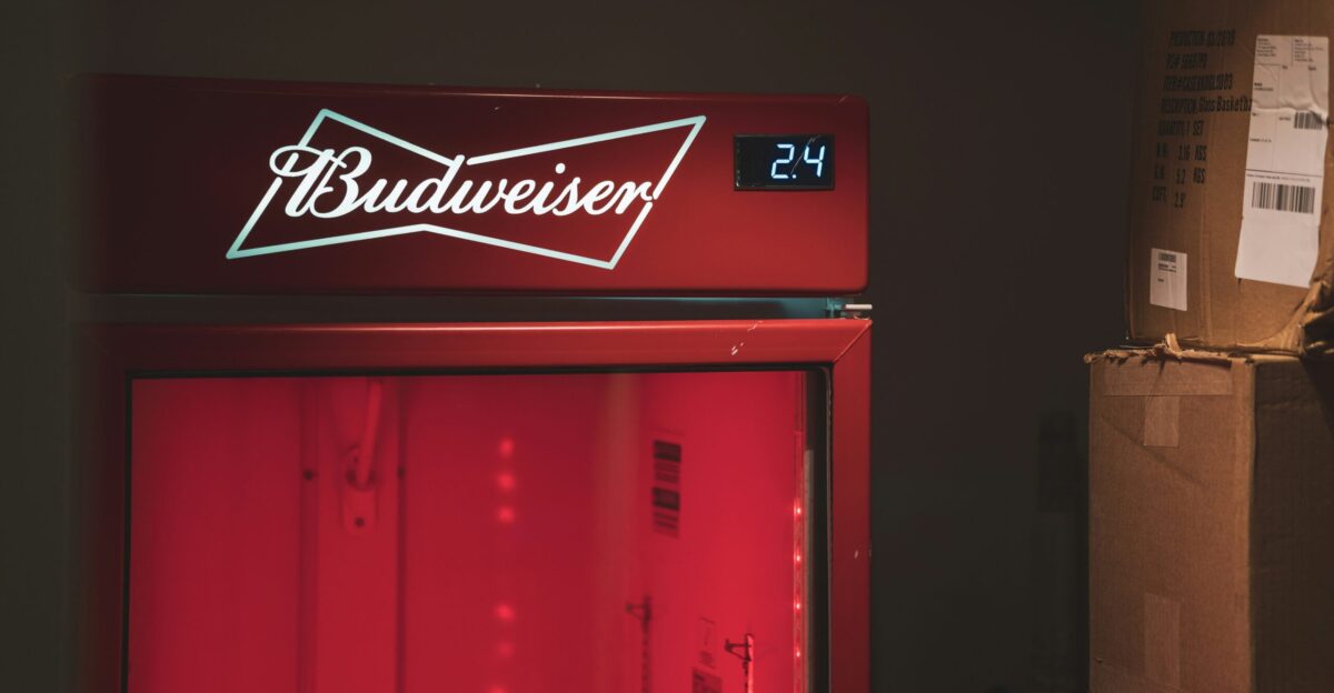 closed red Budweiser refrigerator