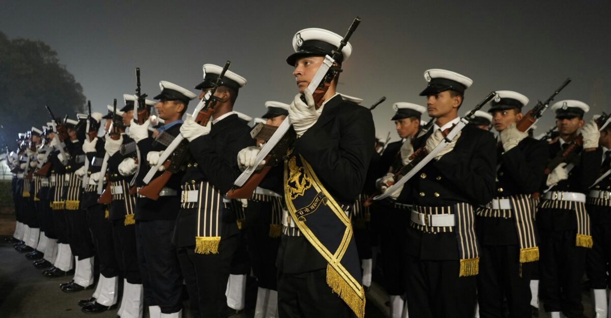 group of men in black and white uniform playing musical instruments