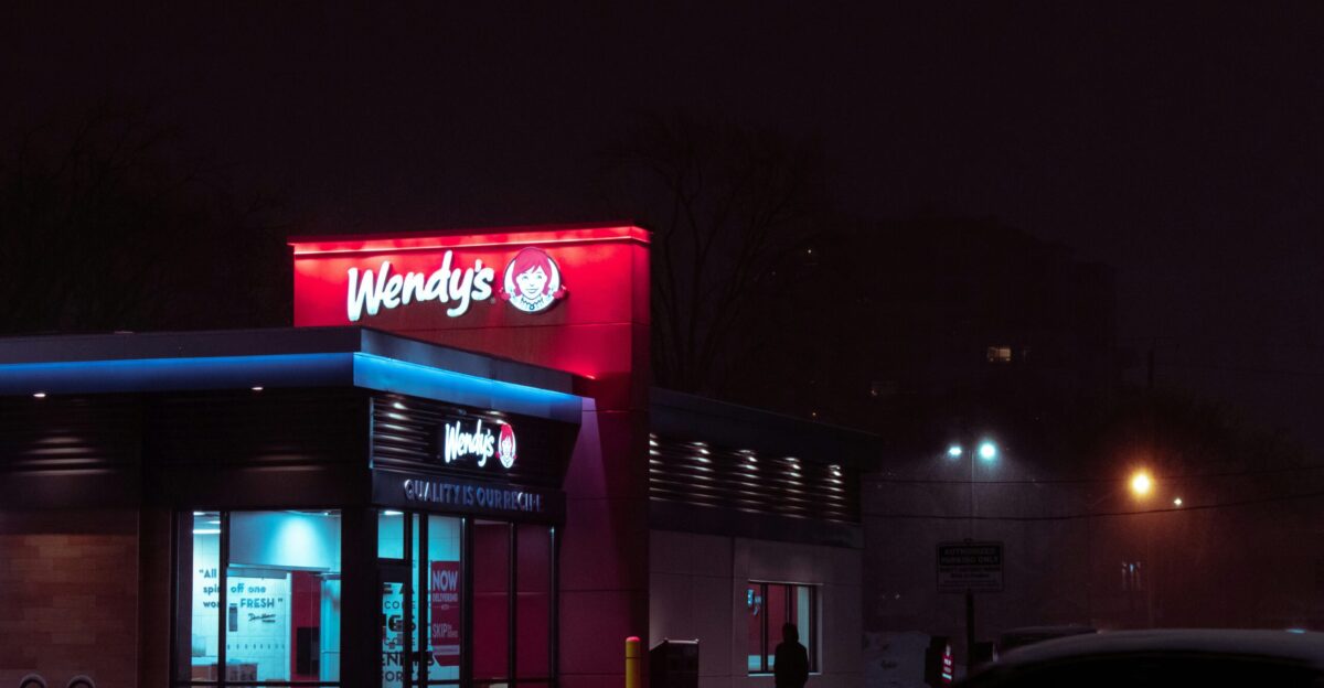 red and white concrete building during nighttime