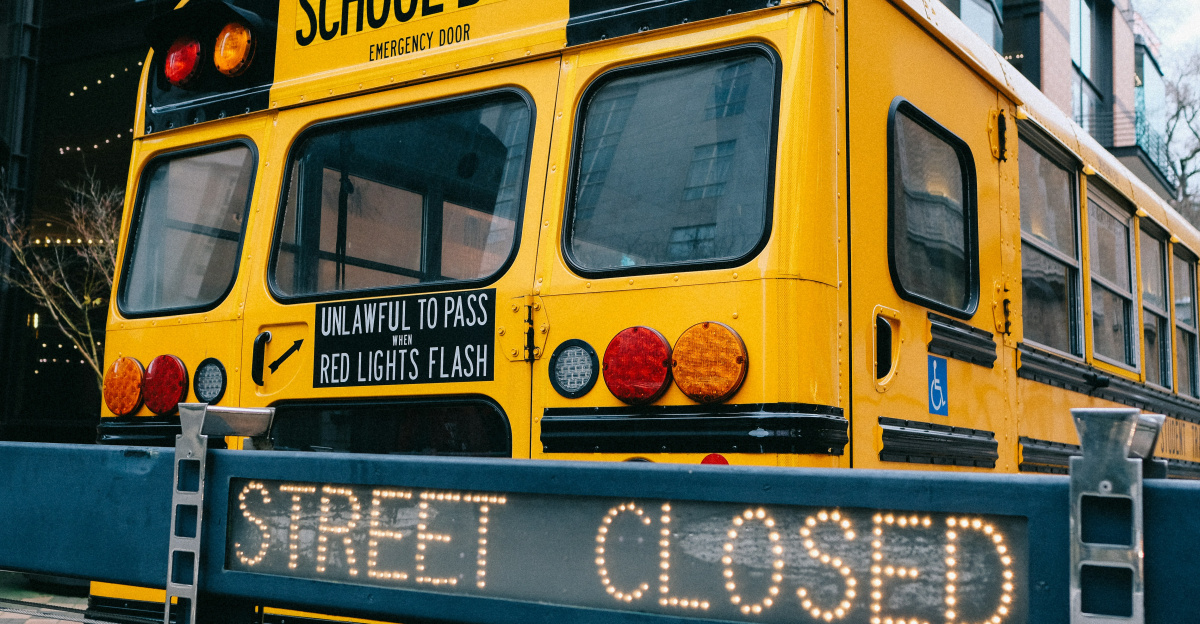yellow school bus on road during daytime