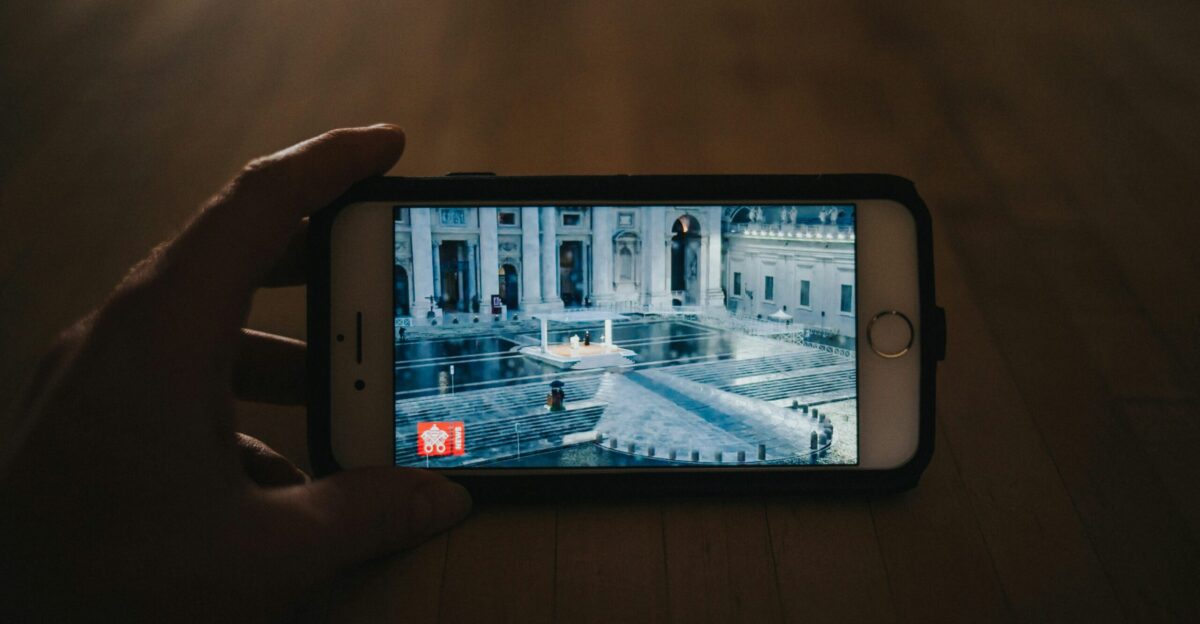 person holding silver iphone 6