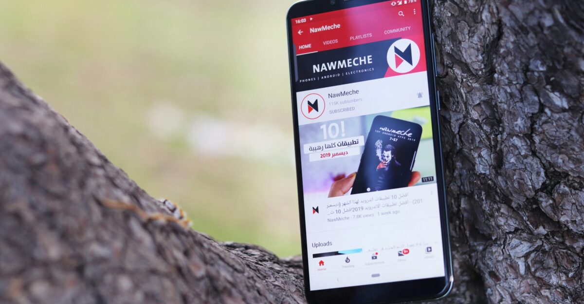 black samsung android smartphone on brown rock