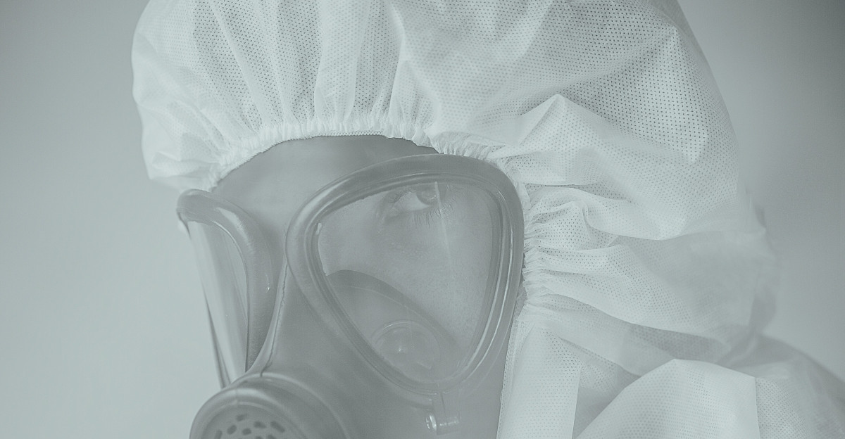 person wearing gas mask in grayscale photography