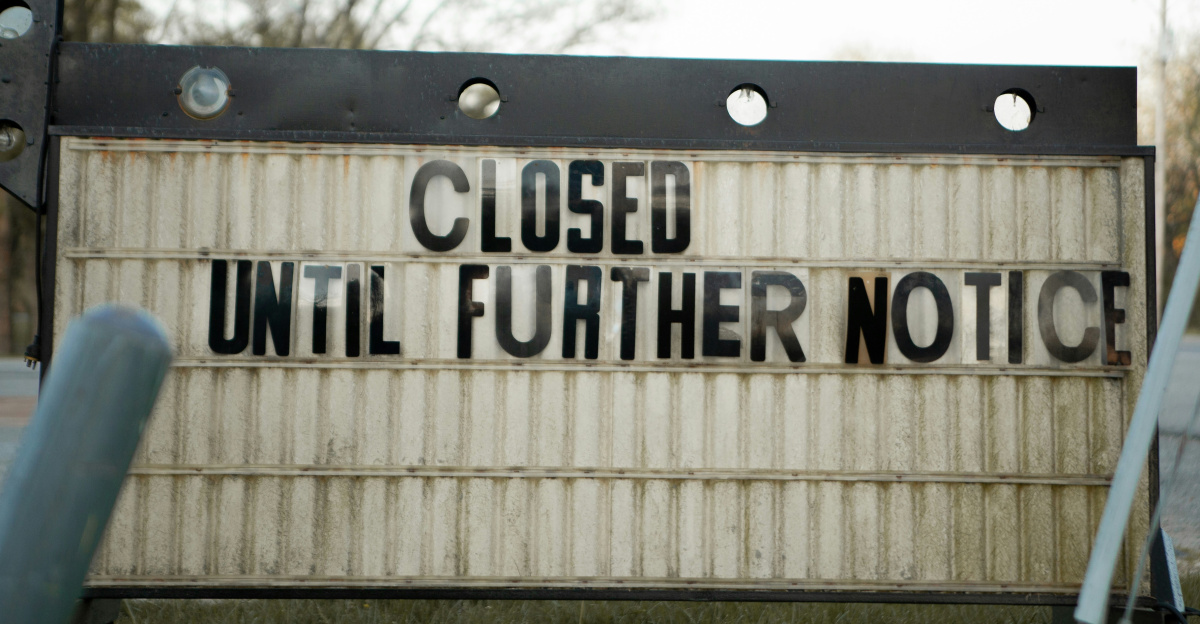 white and black wooden signage