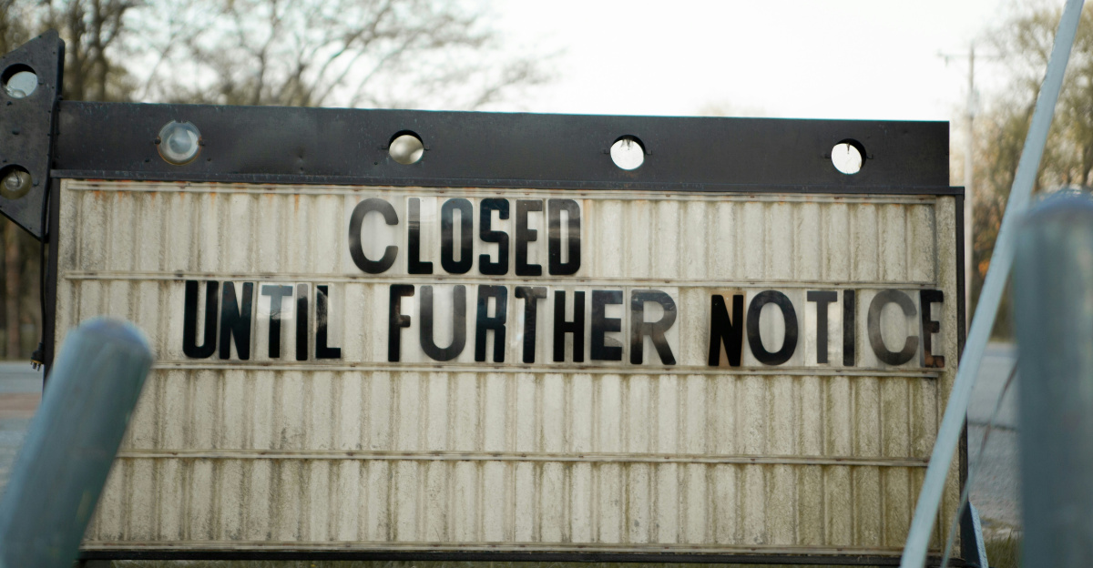 white and black wooden signage