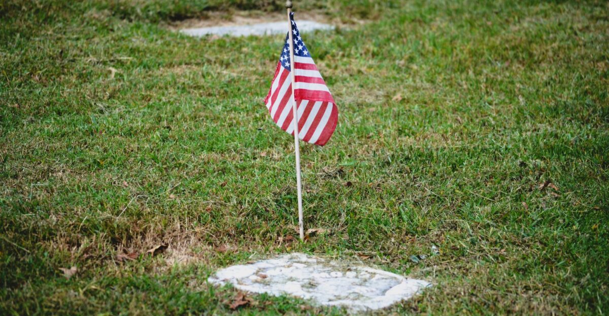 us a flag on gray concrete