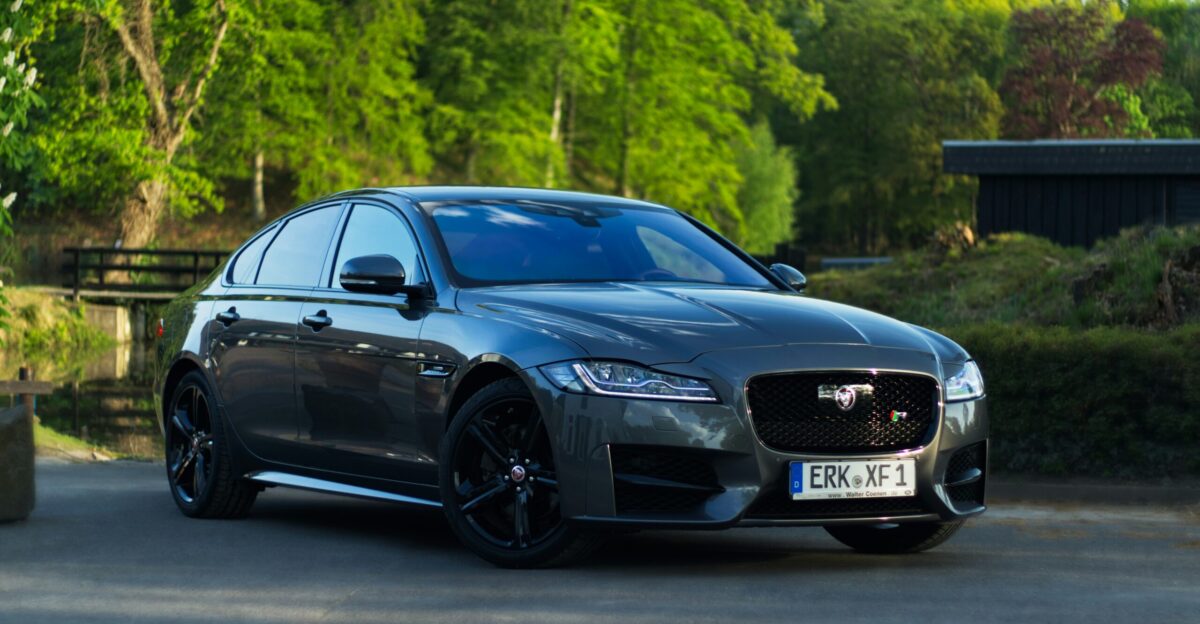 black audi a 4 coupe on road during daytime