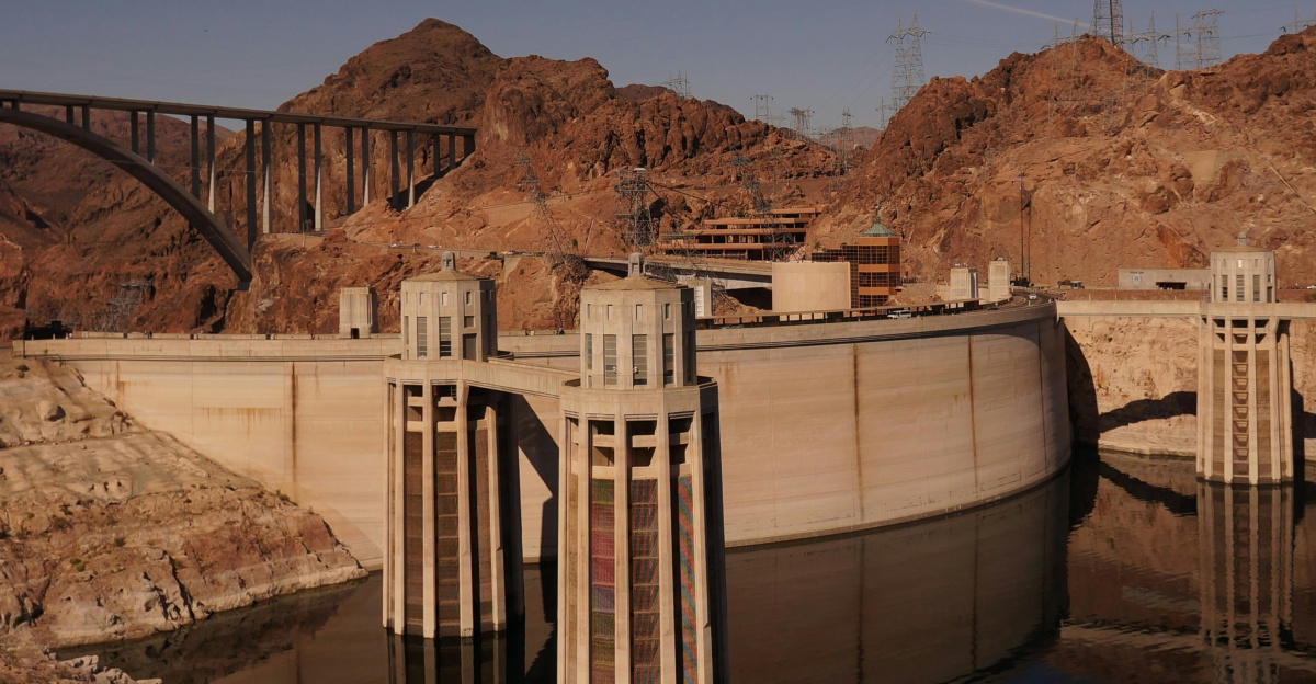 white and brown concrete bridge under blue sky during daytime